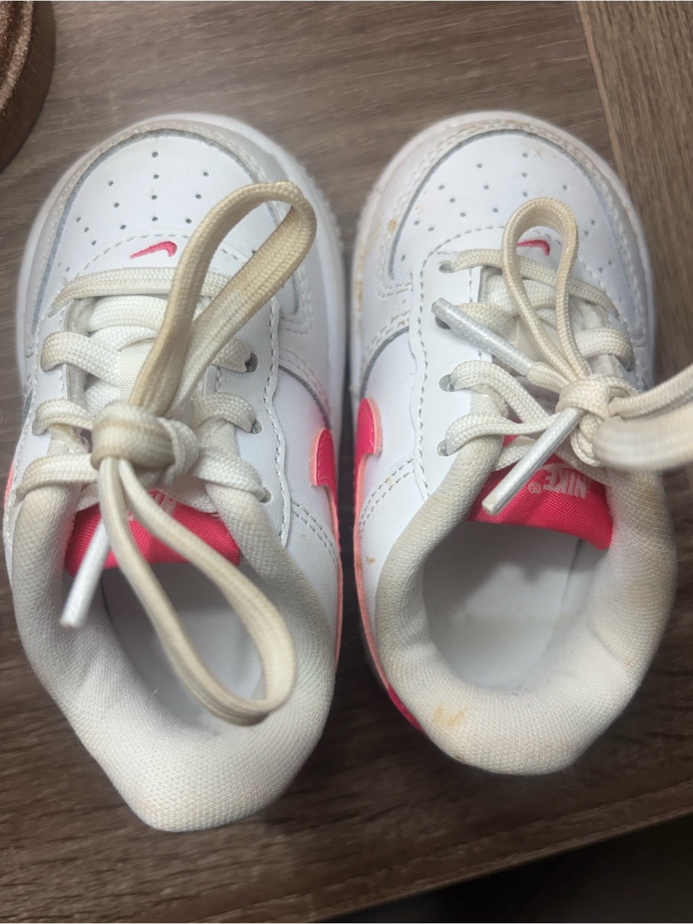 Nike Toddler White Sneakers with Pink Swoosh